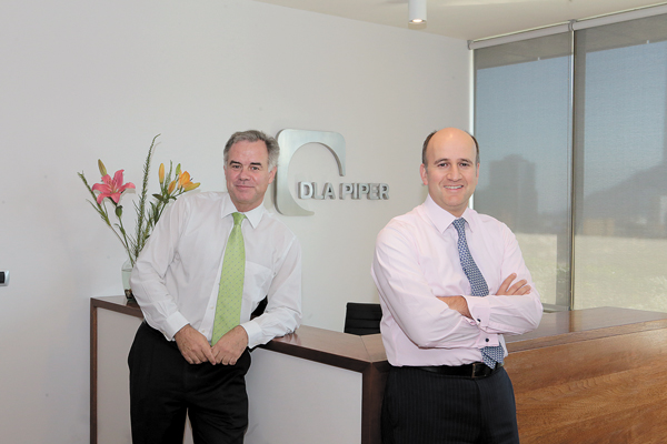 Socios de DLA Piper Chile: “Cada vez va a haber menos espacio para firmas independientes”
