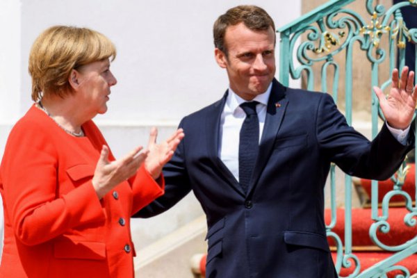 Merkel y Macron pactan refundación del euro