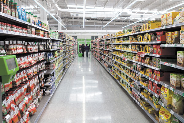 Familias que vendieron a grandes cadenas buscan volver al negocio supermercadista