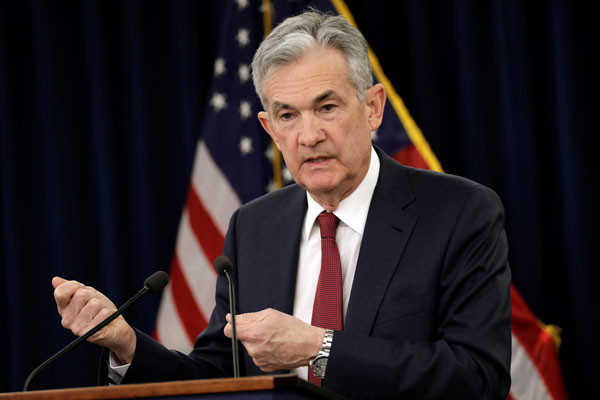 La Fed se resiste a la presión de Trump con nueva alza de tasas y rebaja proyección de crecimiento
