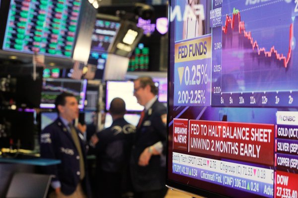 Mercados se tiñen de rojo tras Fed
