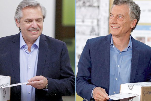 Macri habló de día histórico y Fernández de crisis y responsabilidad en una tranquila jornada electoral