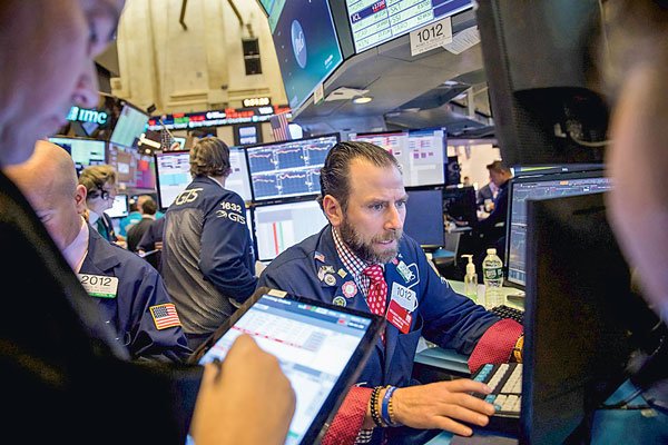 Wall Street se suma al optimismo de las bolsas europeas y parte la semana al alza