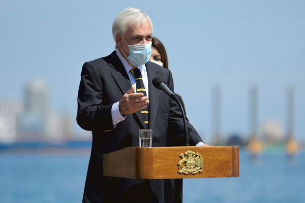 Piñera promulga Ley de Migraciones que busca sincerar razón de arribo de extranjeros y agiliza expulsiones