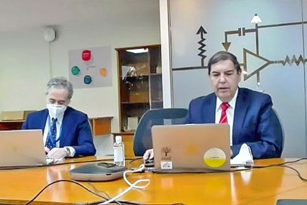 Ernesto Huber y Juan Carlos Olmedo, representantes del Coordinador Eléctrico.