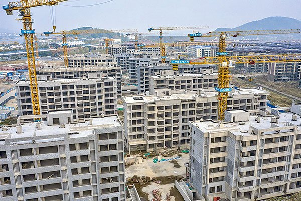 Nuevo desarrollador inmobiliario chino no paga un bono, mientras el gobierno presiona al gigante Evergrande