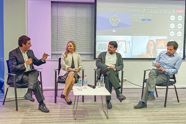 <p>Encuentro de Amcham reunió a los economistas Andrea Tokman, Claudio Agostini y Alejandro Micco. </p>