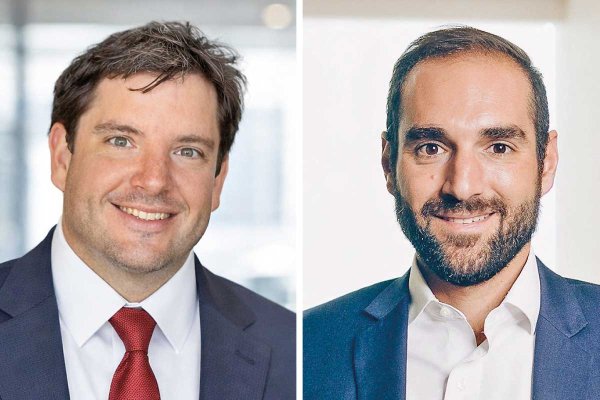 A la izquierda Mario Traub, y a la derecha Andrés Alessandri.