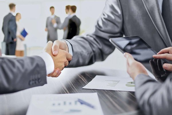 Mercado de fusiones y adquisiciones "revive" en Chile y marca su mejor primer semestre en tres años
